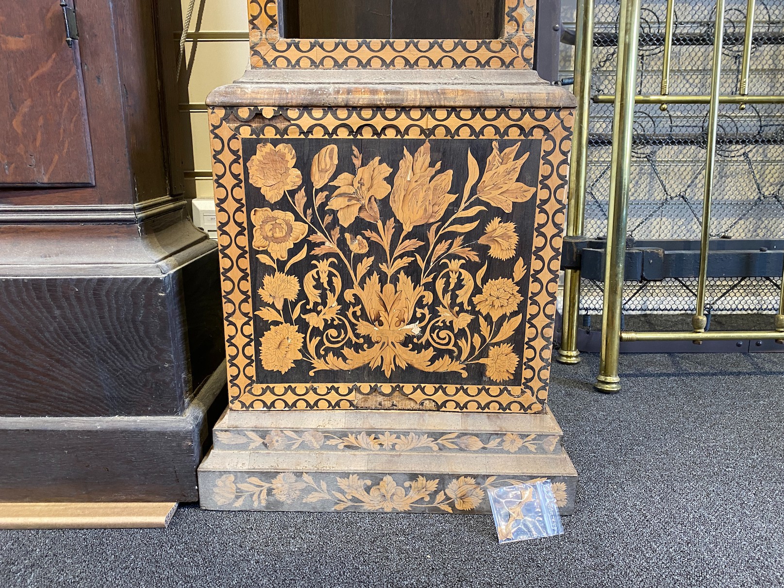 A George III oak longcase clock case and an inlaid clock case, larger 222 cm high.